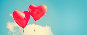 Heart shaped red balloons